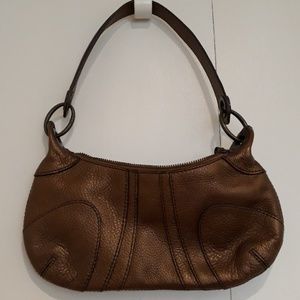 A golden handbag for the golden gal!